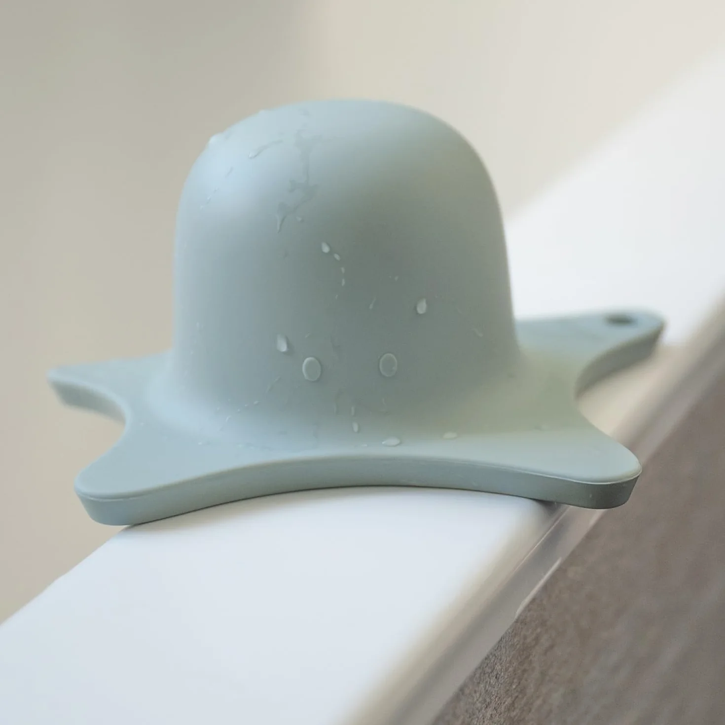 Kindsgut aide de douche en silicone forme d'étoile pour enfants sans BPA aquamarine