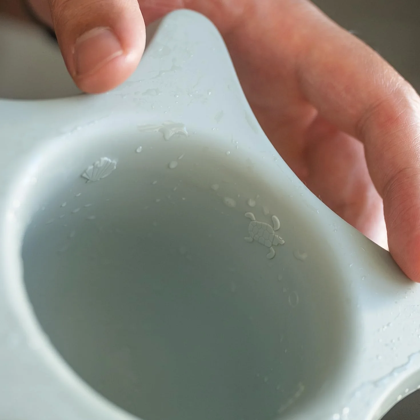 Kindsgut aide de douche en silicone forme d'étoile pour enfants sans BPA aquamarine